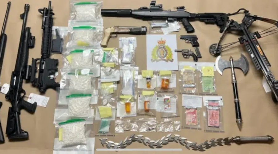 Two Arrested After Police Seize Drugs, Firearms