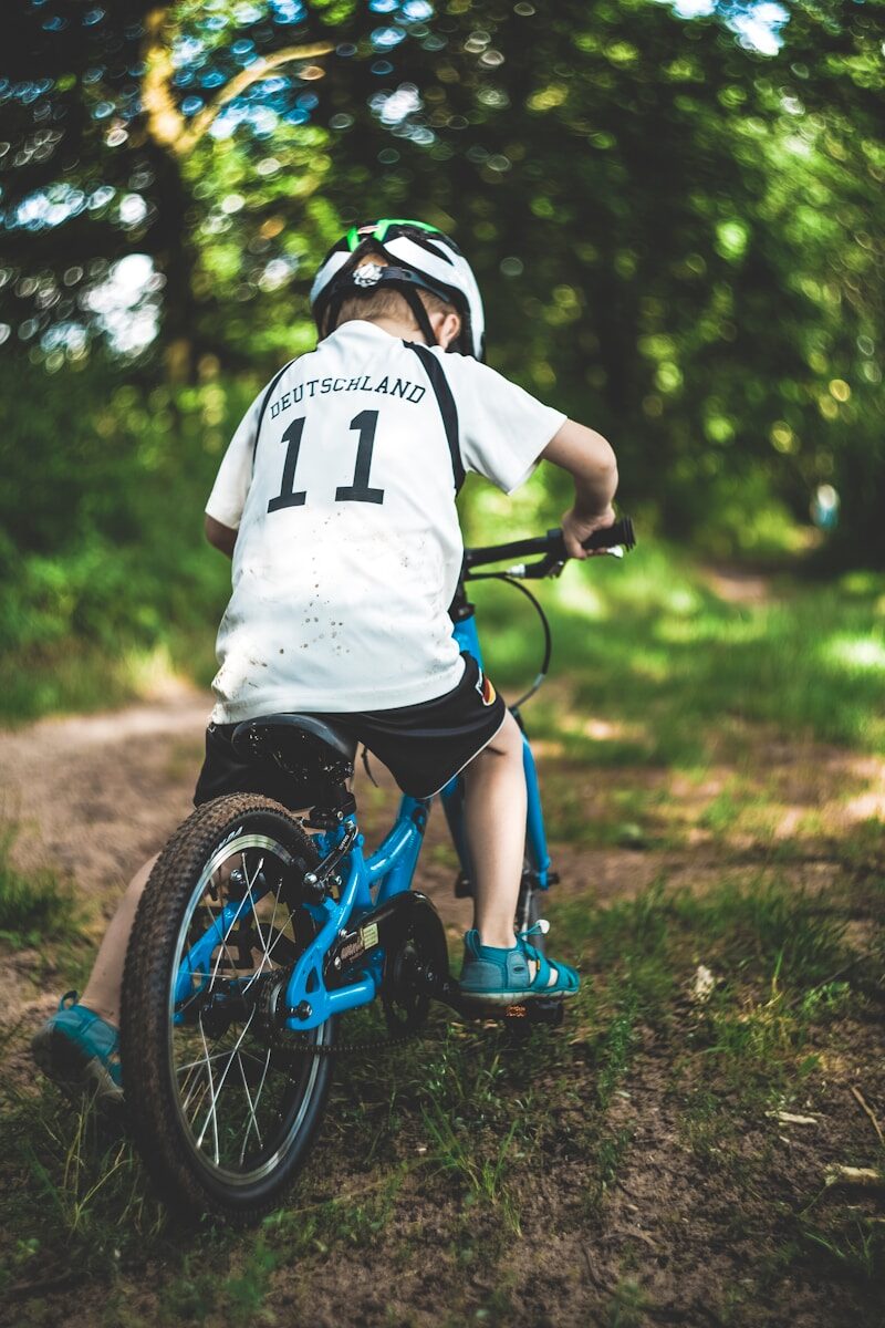 boy riding bicycle